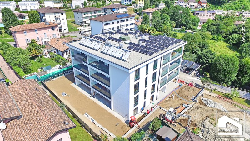 Modern prefab multi-family building in Vacallo