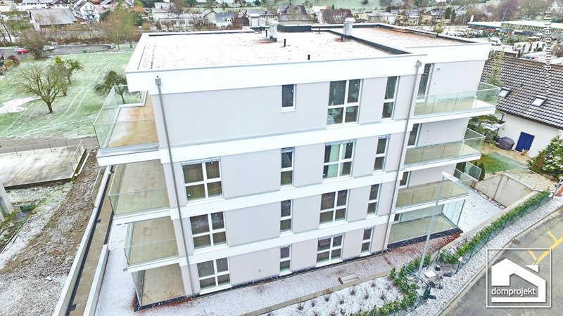Contemporary prefab multi-family building in Lengnau