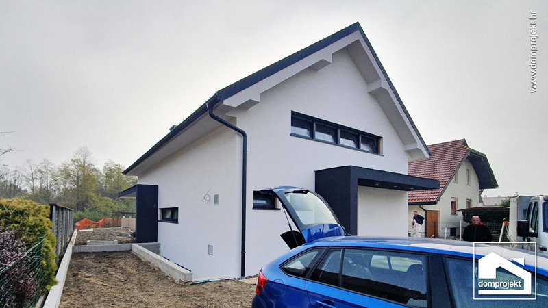 Contemporary prefab house with attic in Domžale