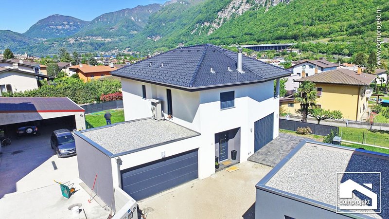 Family two-storey prefab house in Riva San Vitale